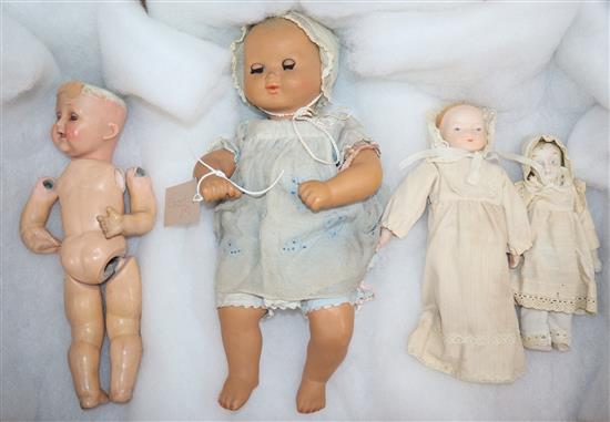 A 1950s Italian clockwork crying doll, a Heubach Koppelsdorf doll and two bisque dolls